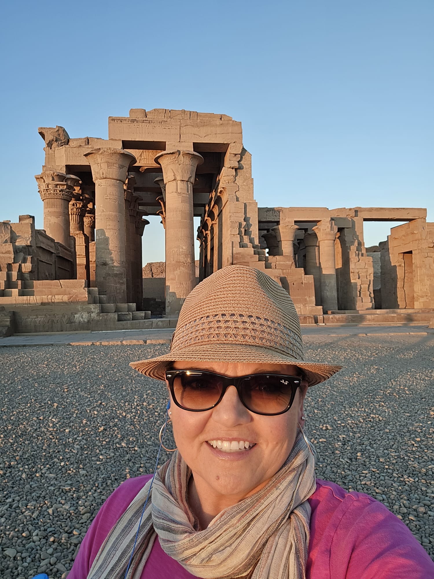 Tiffany Watt in front of the Temple of Kom Ombo on the Nile at sunrise