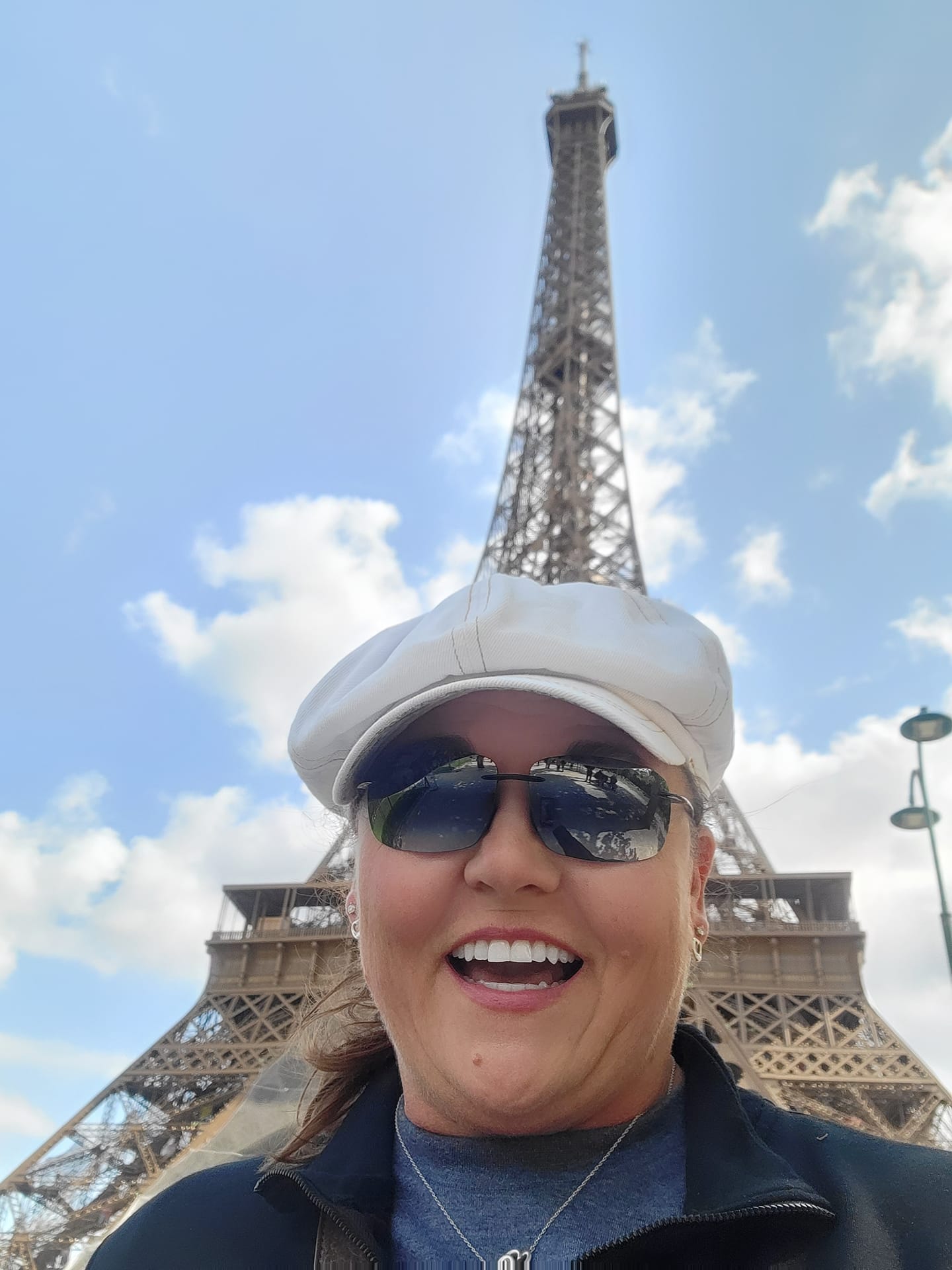 Tiffany Watt in front of the Eiffel Tower in Paris, France