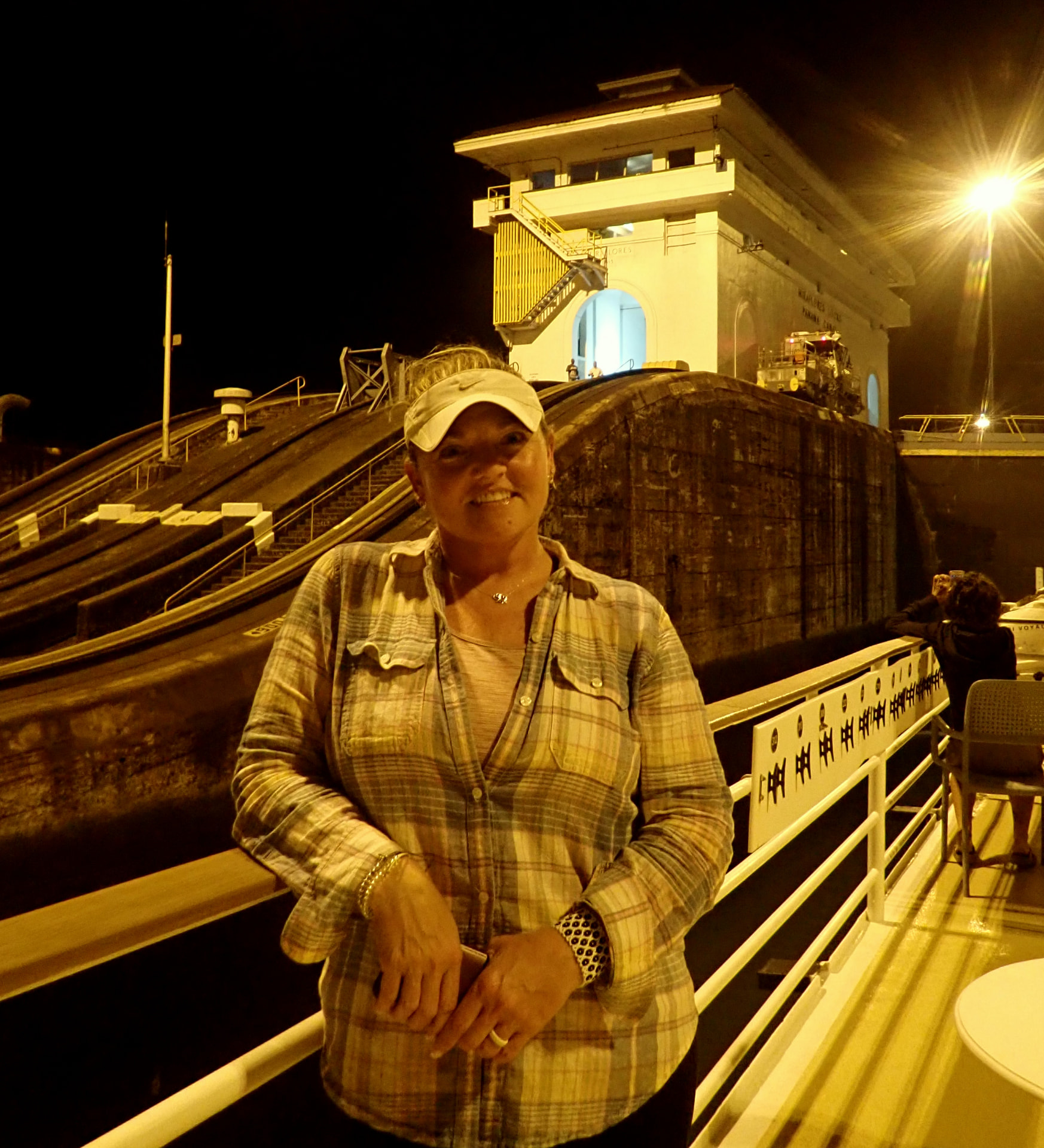 Tiffany Watt on a ship sailing through the Panama Canal at night