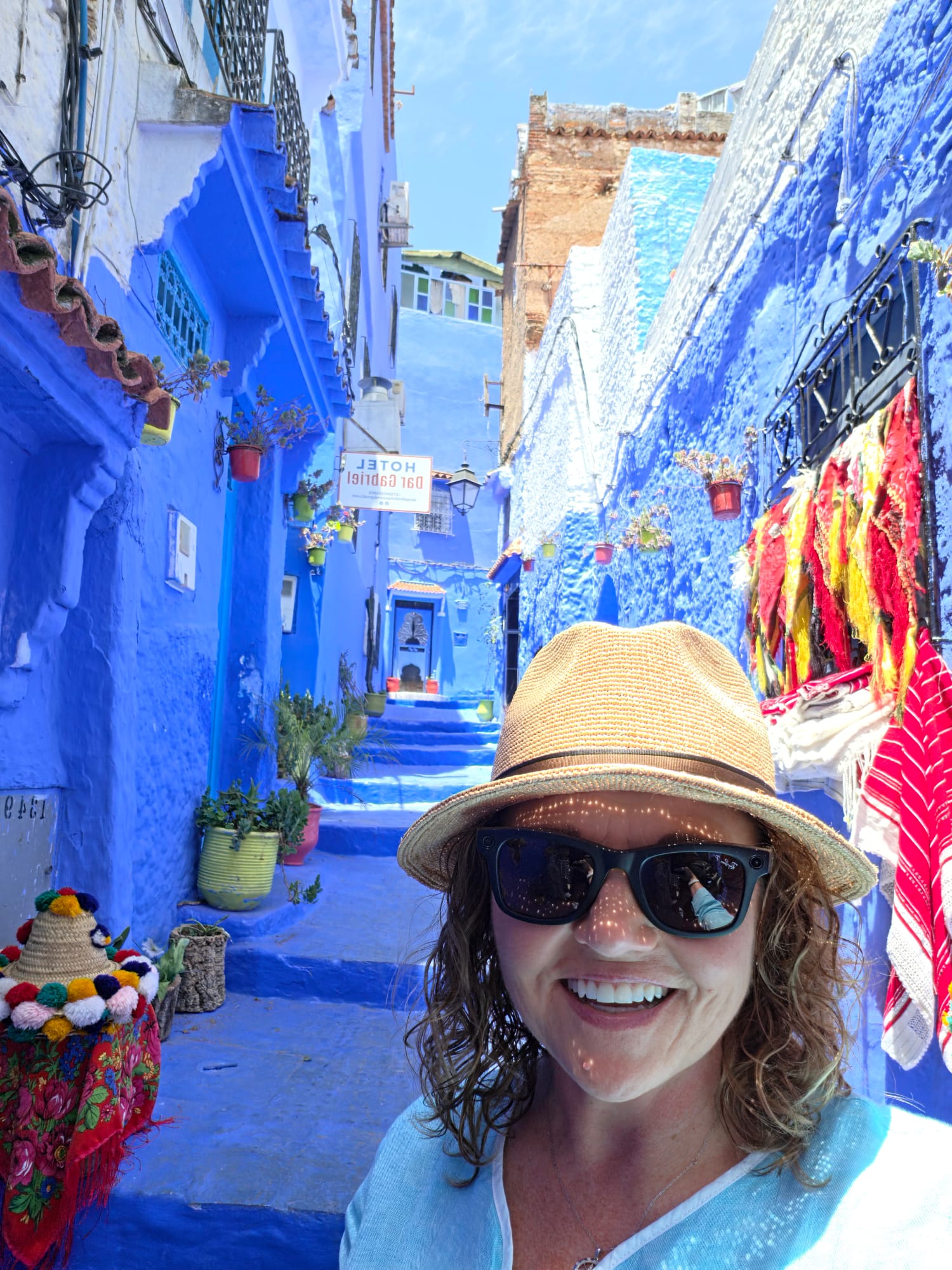 Tiffany Watt in a blue alley in Chefchaouen, Morocco, the Blue City