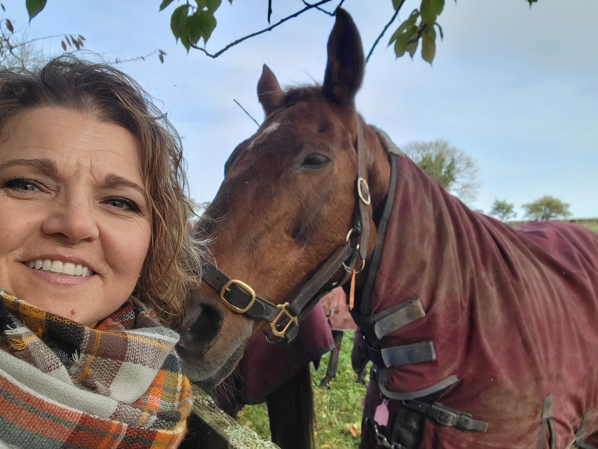 Tiffany Watt beside a horse at the Irish National Stud Farm & Gardens