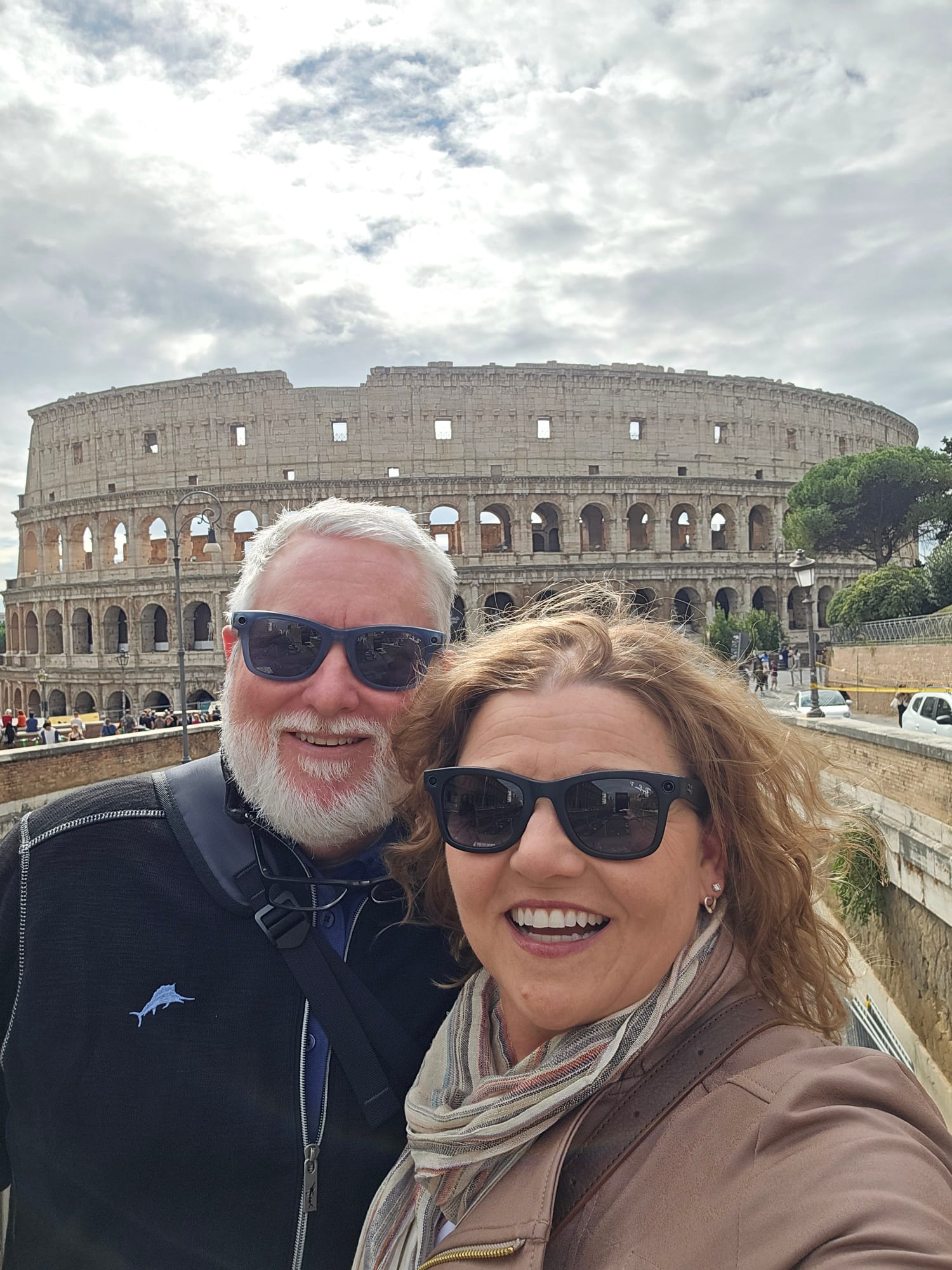 Tiffany Watt and her husband in front of the Colosseum in Rome, Italy